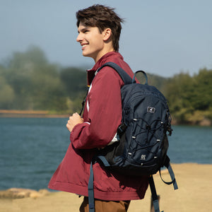 OIWAS EXPLORER lightweight backpack carried by urban commuter — ideal for daily use, weekend trips, or light hiking adventures