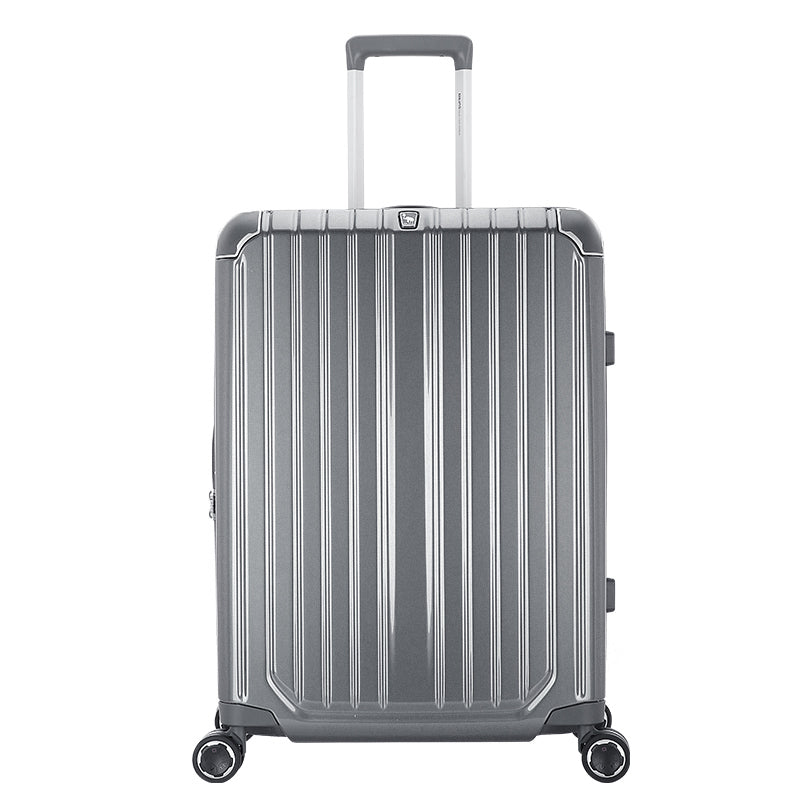 Aerospace-grade aluminum telescopic handle with three height settings, extended from OIWAS CLAD carry-on.