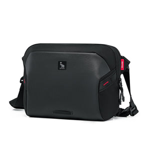 Side angle highlighting structured shape and fabric splicing of the OIWAS ELEPHANTOM bag Medium size.