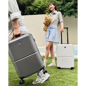 OIWAS Horizon X carry-on luggage fitting perfectly in airplane overhead bin — compliant with major airline size restrictions worldwide