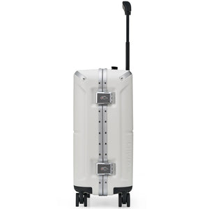 Side view of OIWAS Horizon X carry-on showing robust aluminum frame construction, recessed TSA lock, and smooth-gliding spinner wheels.