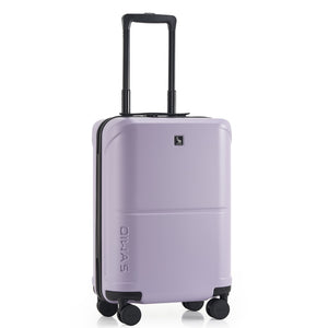 OIWAS Horizon X Series carry-on luggage in sleek black, rolling silently through an airport terminal.