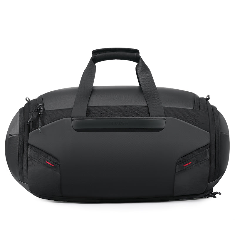 Minimalist red webbing on bag sides doubles as a utility rail for modular add-ons