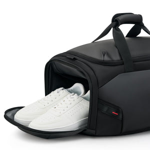 Close-up of the water-resistant, shockproof shoe compartment on the ELEPHANTOM multifunctional travel bag, designed to protect your footwear while traveling.