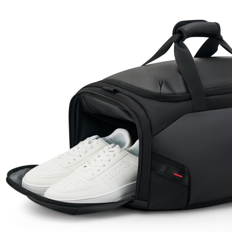 Close-up of the water-resistant, shockproof shoe compartment on the ELEPHANTOM multifunctional travel bag, designed to protect your footwear while traveling.