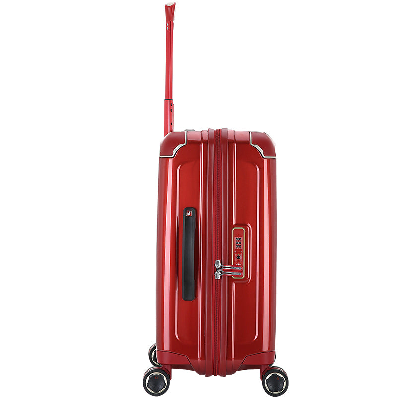 Side profile of red CLAD carry-on showing smooth curves, recessed TSA lock, and flush-mounted spinner wheels.
