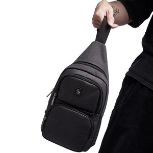 OIWAS black chest bag worn as crossbody sling for men