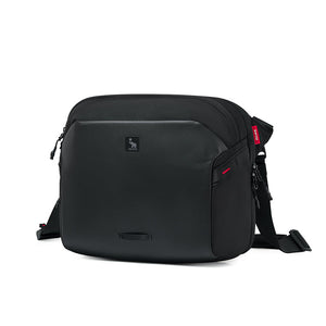 Worn by traveler: Large ELEPHANTOM messenger bag as a standalone carry for day trips