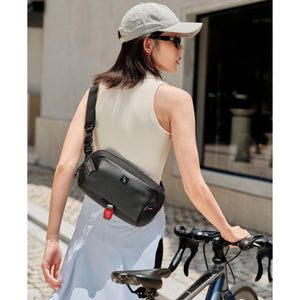 Adjustable, padded shoulder strap detail on the OIWAS Small ELEPHANTOM messenger for all-day comfort