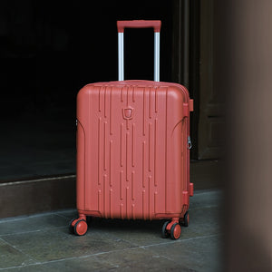 OIWAS red expandable carry-on luggage in fine brushed finish, standing upright on a floor—durable, airline-approved, and designed for modern travelers.