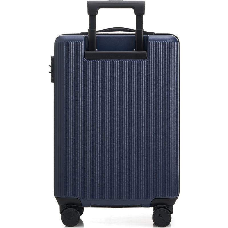 Blue suitcase with a textured surface on a white background — OIWAS Edge Collection