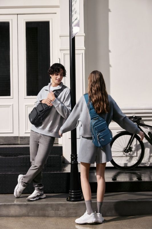 OIWAS travel bags collection—sleek sling bags, messenger, weekender bags, toiletry kits and packing cubes for organized journeys